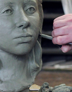 Sculpting the figure in clay